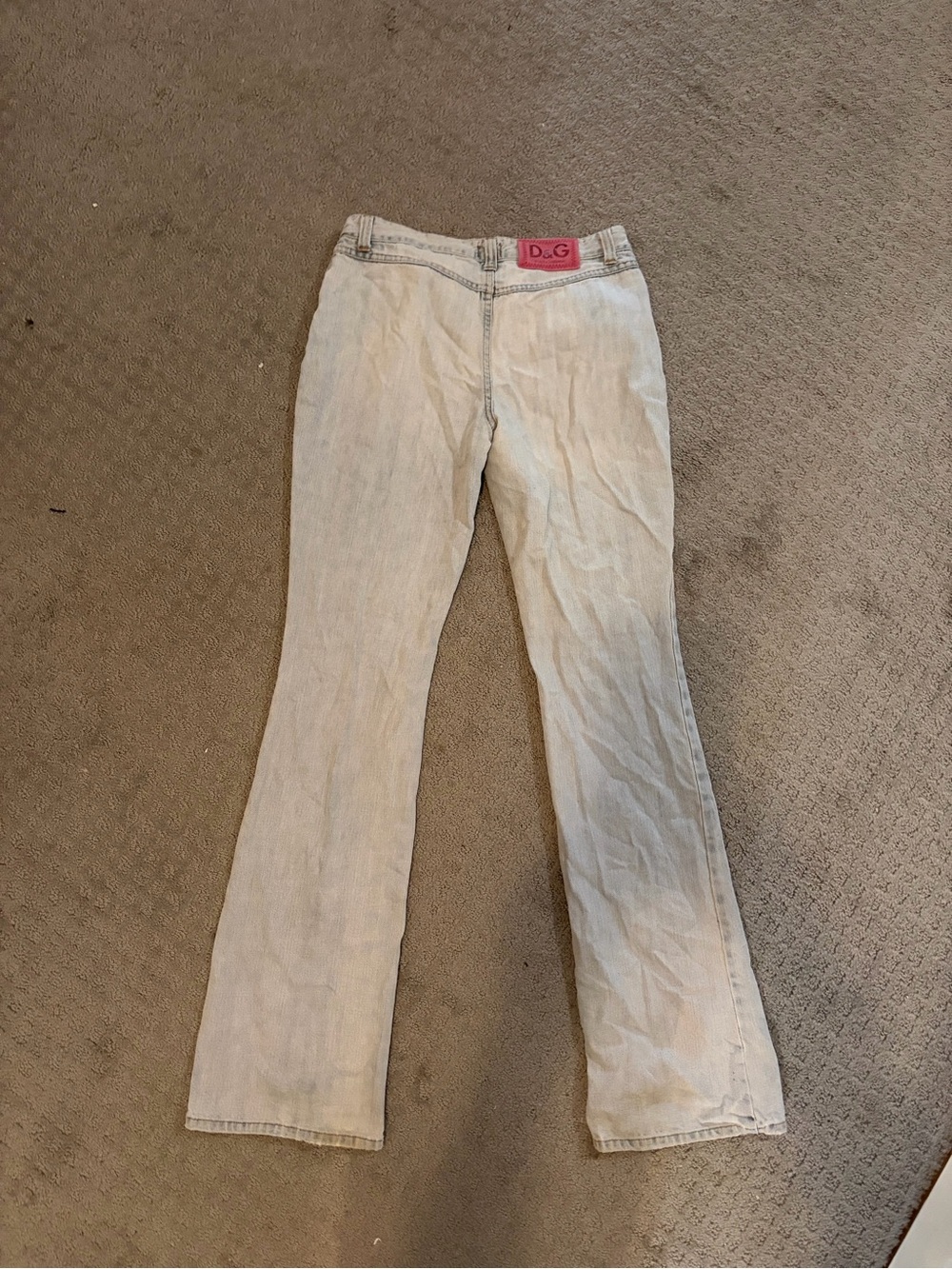 Dolce & Gabbana Light Wash Flare Jeans with Pink Logo Patch